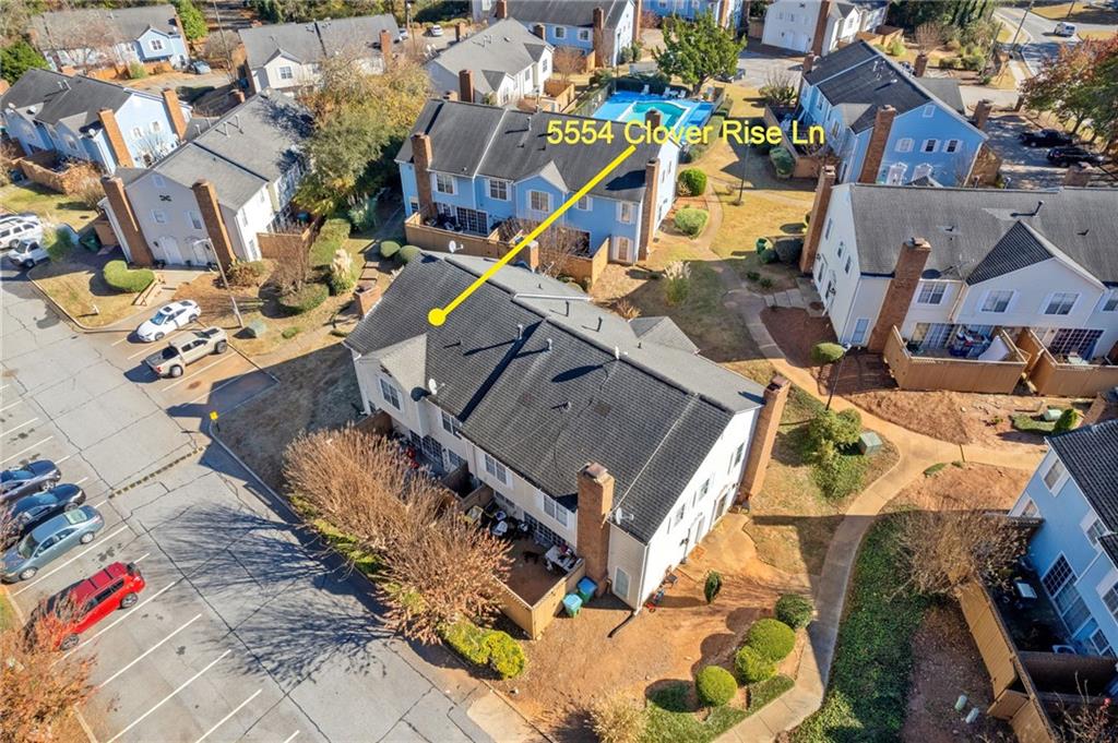 5554 Clover Rise Lane, Unit 2 Norcross, GA 30093 - Photo 2 of 18 an aerial view of residential houses with outdoor space