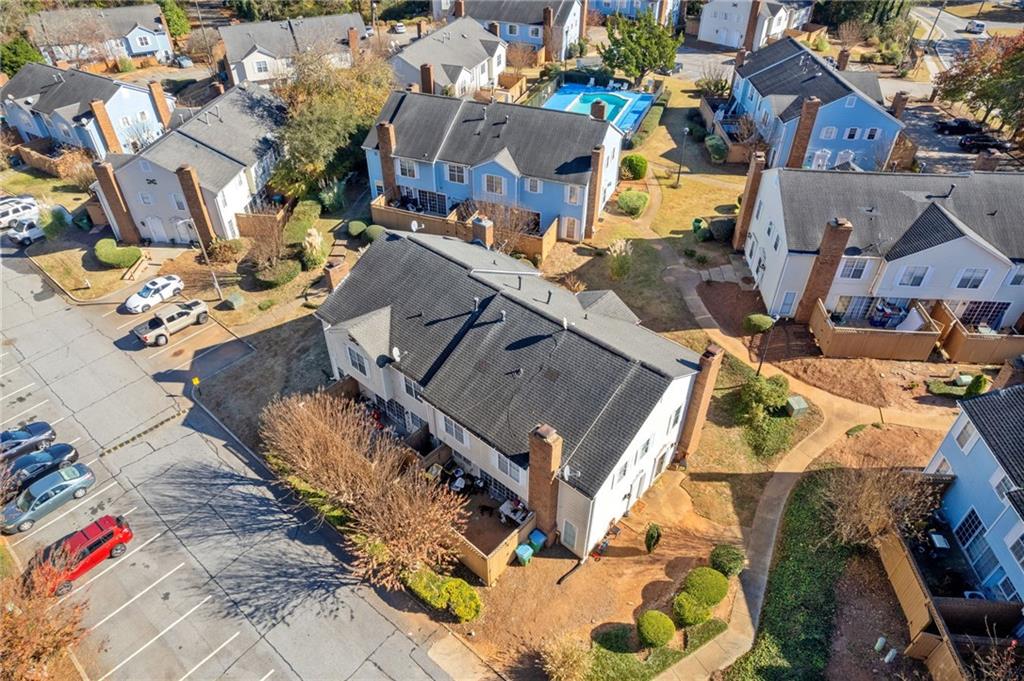 5554 Clover Rise Lane, Unit 2 Norcross, GA 30093 - Photo 10 of 18 an aerial view of residential houses with outdoor space
