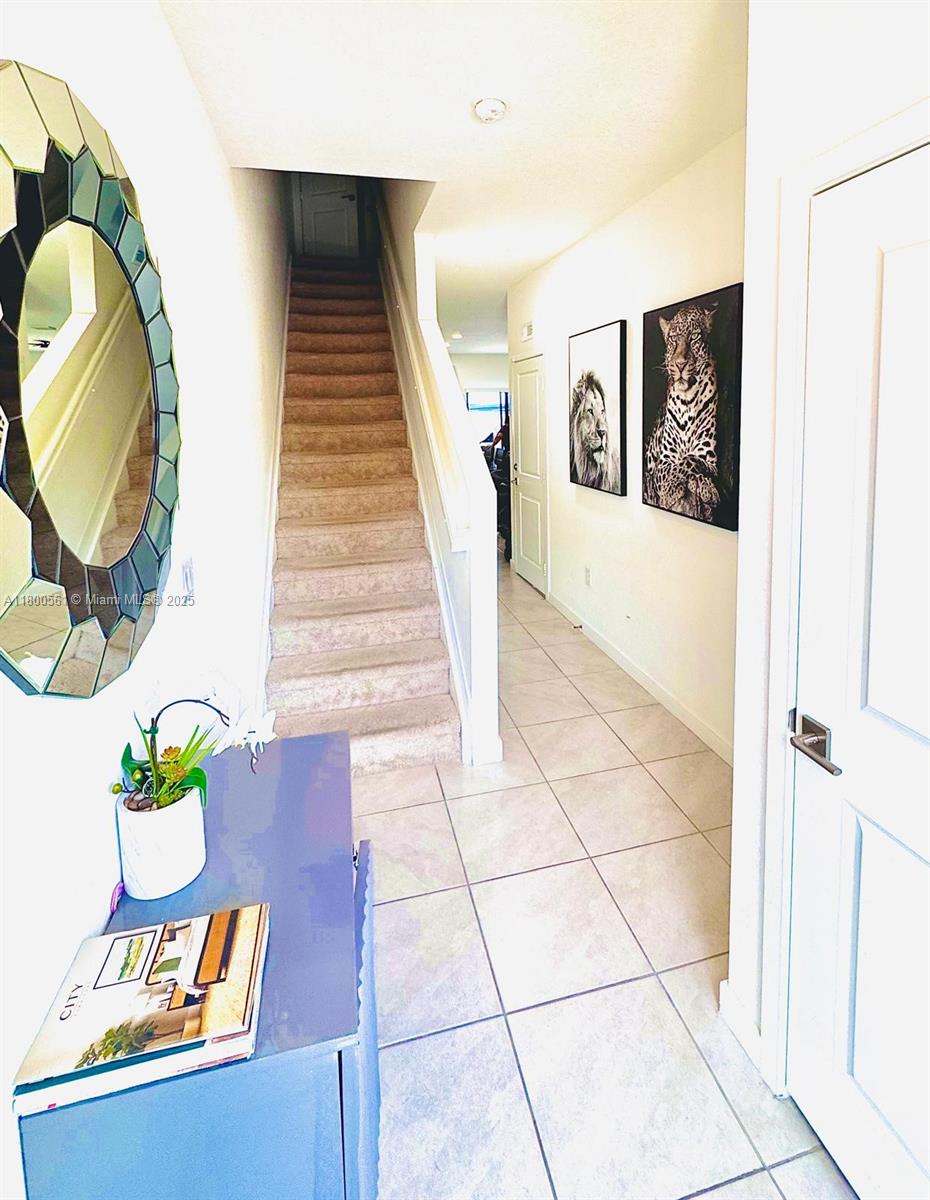 761 Southwest 11th Street, Unit 761 Florida City, FL 33034 - Photo 15 of 18 a view of an entryway with wooden floor