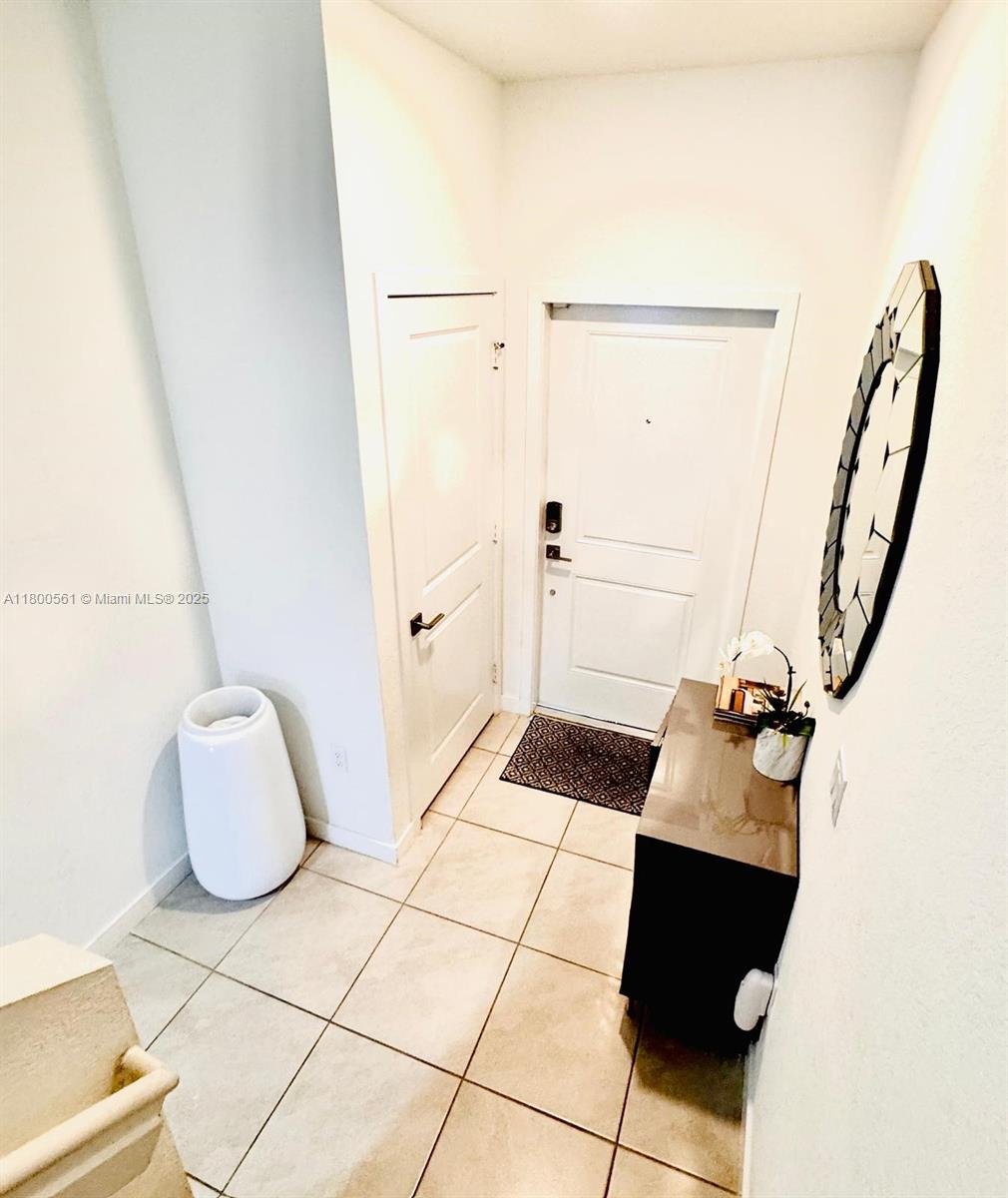 761 Southwest 11th Street, Unit 761 Florida City, FL 33034 - Photo 18 of 18 a bathroom with a sink and mirror