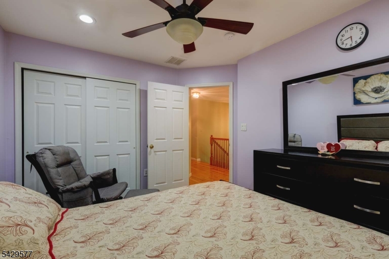 115 Constitution Way Bernards, NJ 07920 - Photo 14 of 31 a bedroom with a bed and a dresser