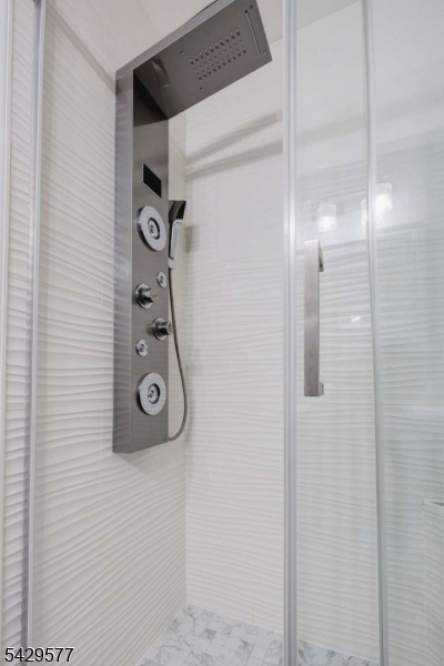 115 Constitution Way Bernards, NJ 07920 - Photo 17 of 31 a bathroom with a shower