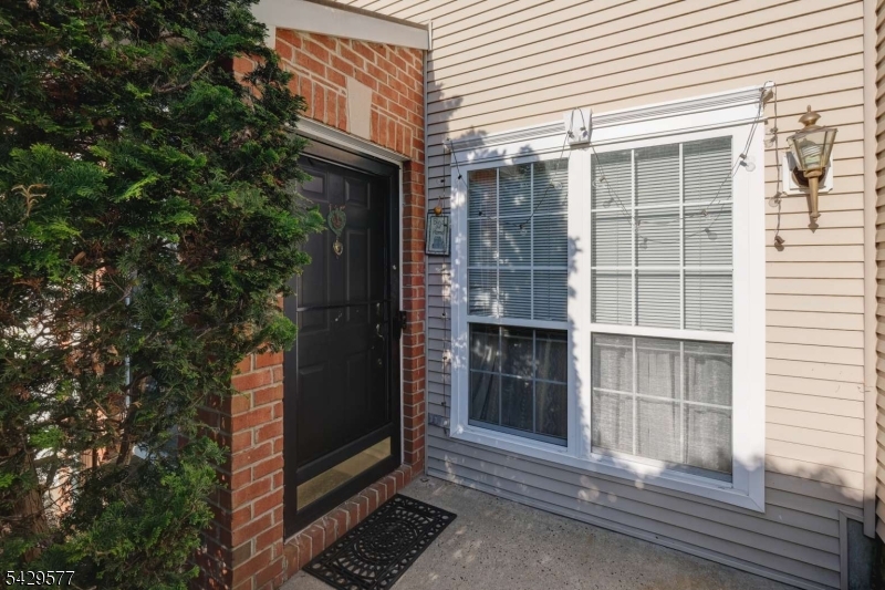 115 Constitution Way Bernards, NJ 07920 - Photo 2 of 31 a view of a door and a window