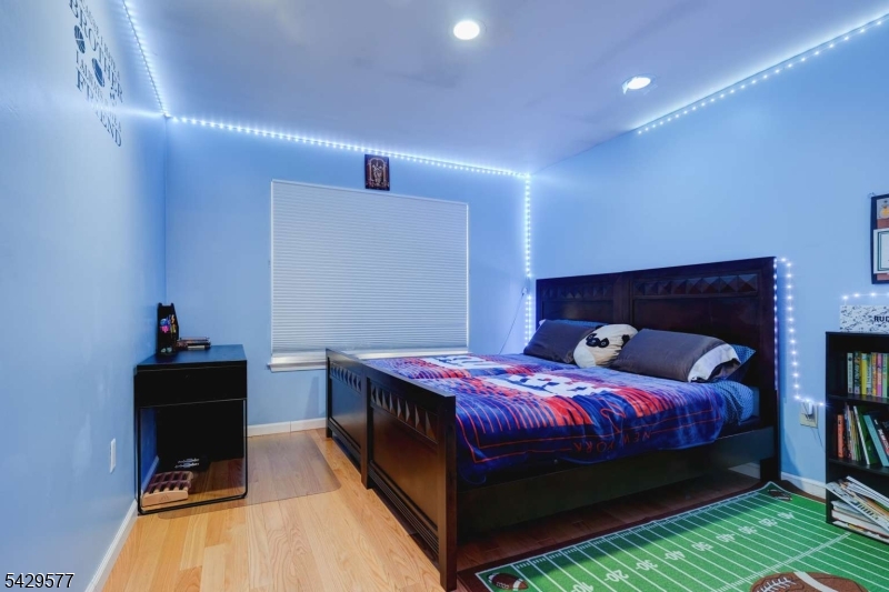 115 Constitution Way Bernards, NJ 07920 - Photo 23 of 31 a bedroom with a bed and a table