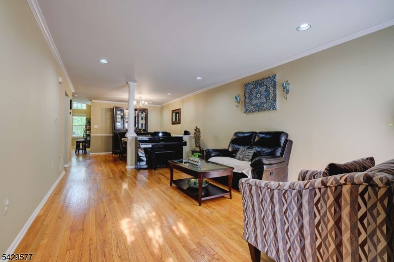 115 Constitution Way Bernards, NJ 07920 - Photo 3 of 31 a living room with furniture
