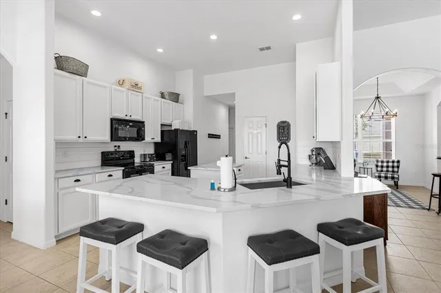 a large kitchen with cabinets