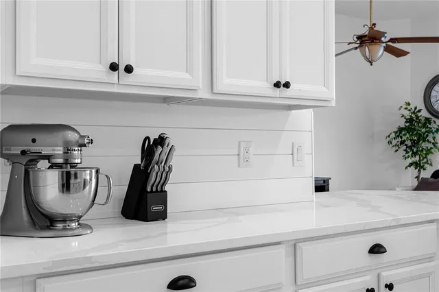 a view of a a dining room with furniture