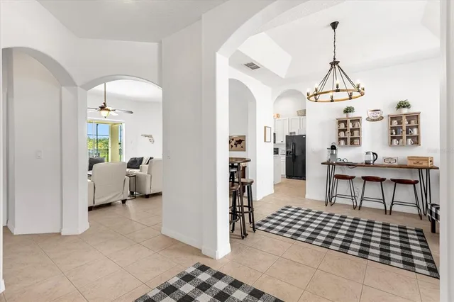 a view of a room with a table and chair