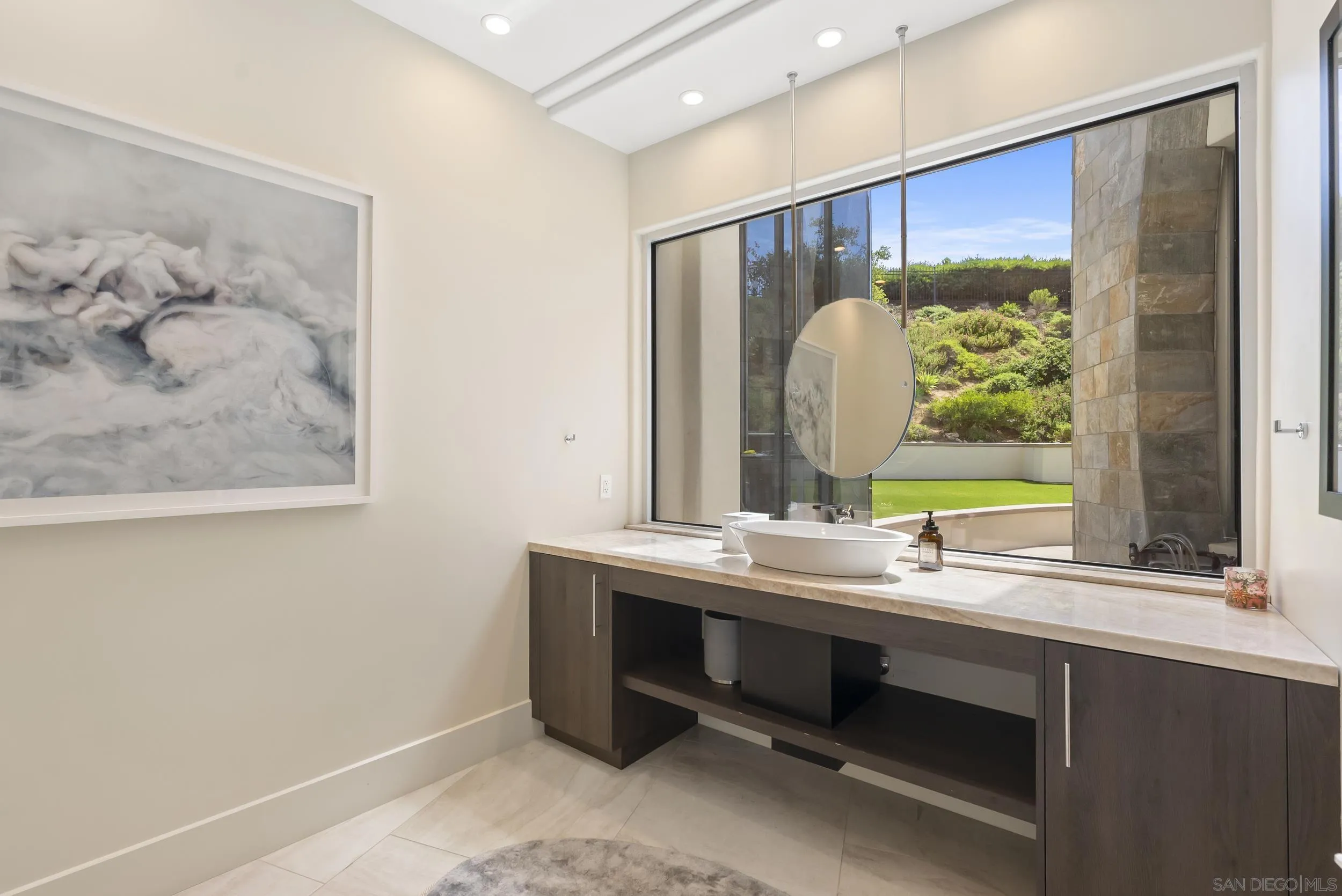 13220 Highlands Ranch Road Poway, CA 92064 - Photo 13 of 44 a bathroom with a double vanity sink and a mirror