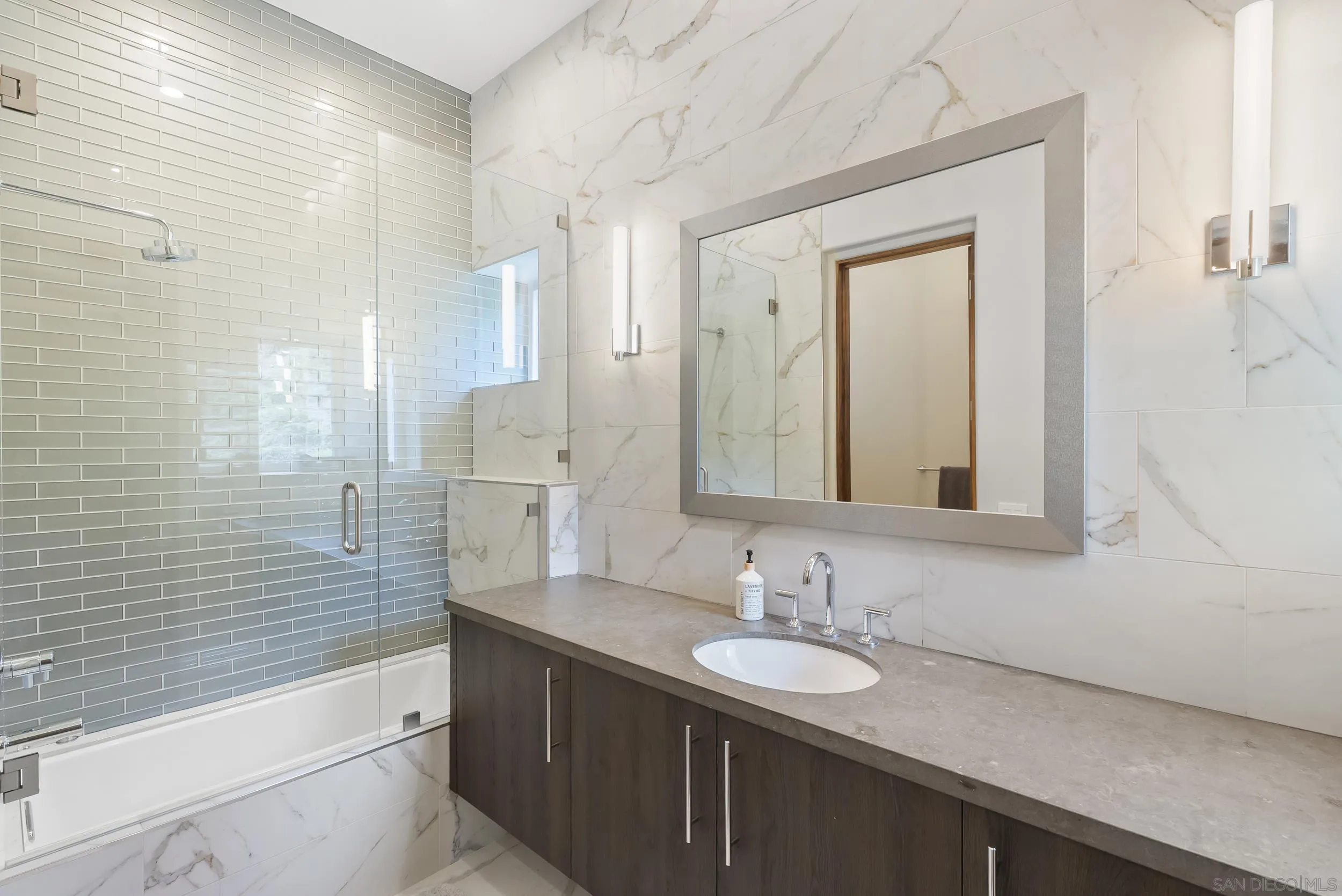 13220 Highlands Ranch Road Poway, CA 92064 - Photo 15 of 44 a bathroom with a granite countertop sink mirror and a bathtub