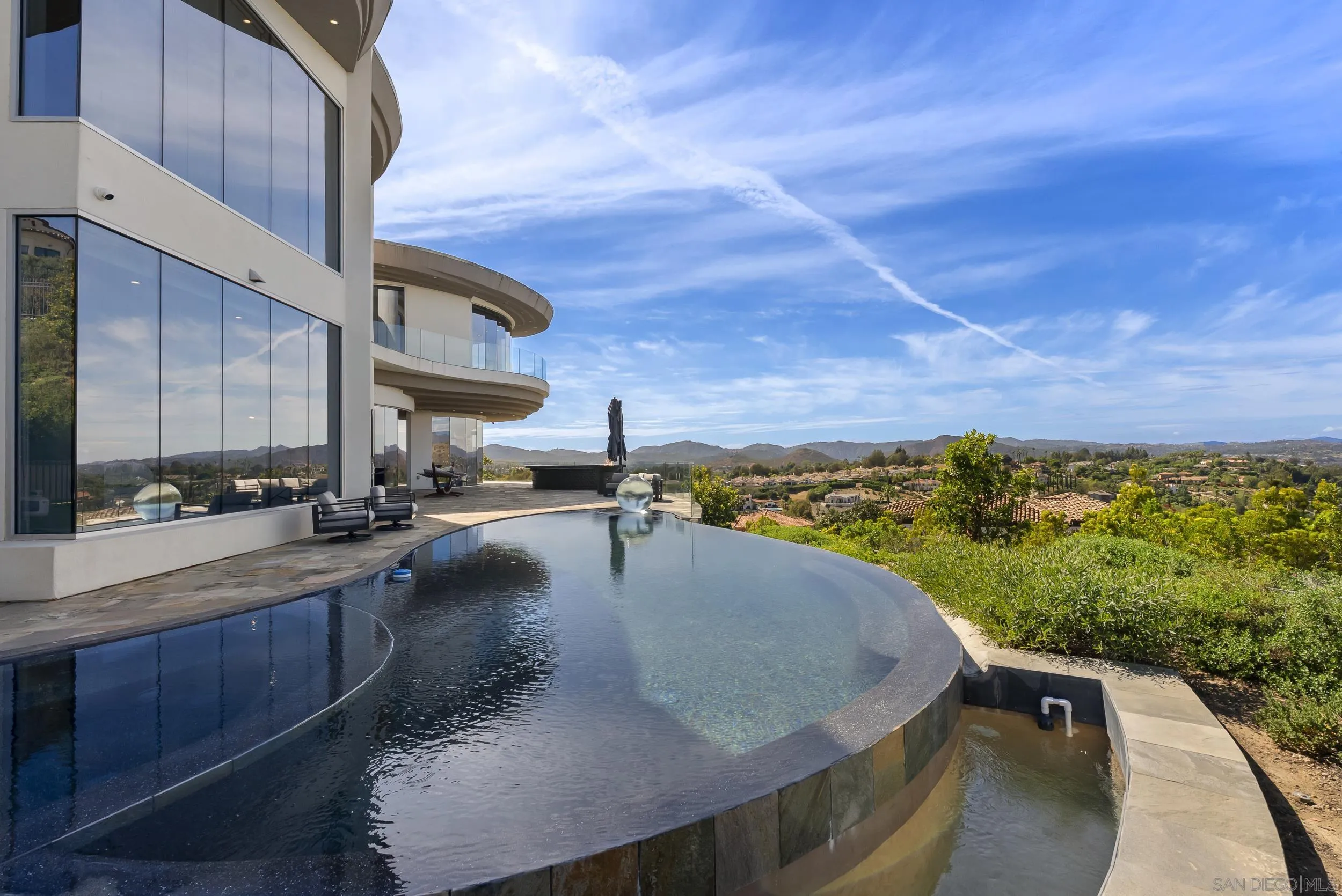 13220 Highlands Ranch Road Poway, CA 92064 - Photo 2 of 44 a terrace with outdoor seating and city view