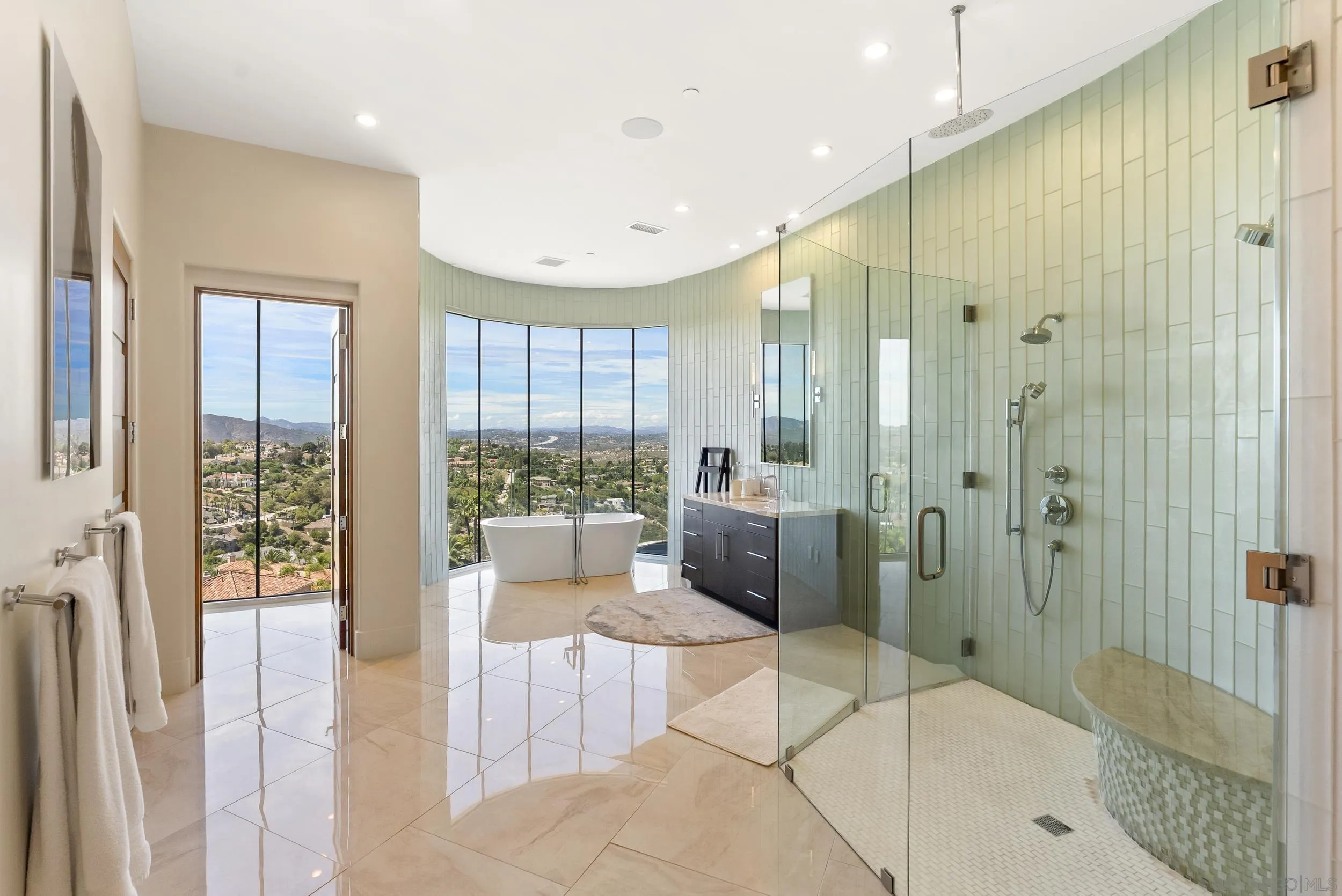 13220 Highlands Ranch Road Poway, CA 92064 - Photo 23 of 44 a bathroom with a tub shower and sink