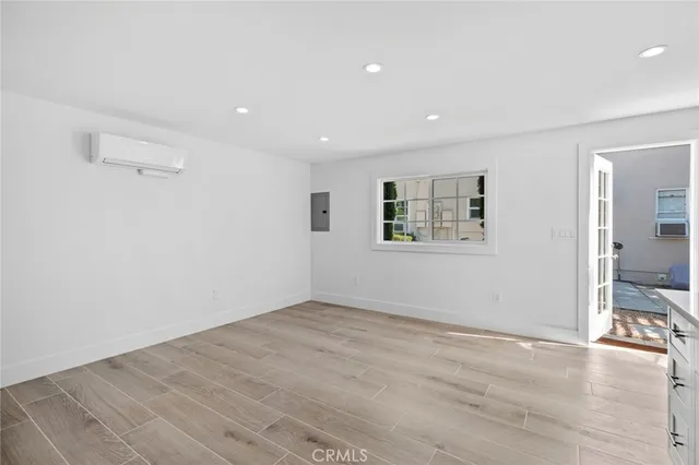 a view of livingroom with hardwood floor and a ceiling fan