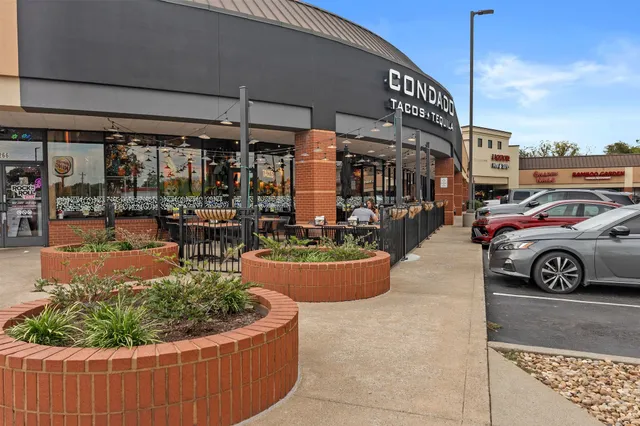 a car parked in front of a building