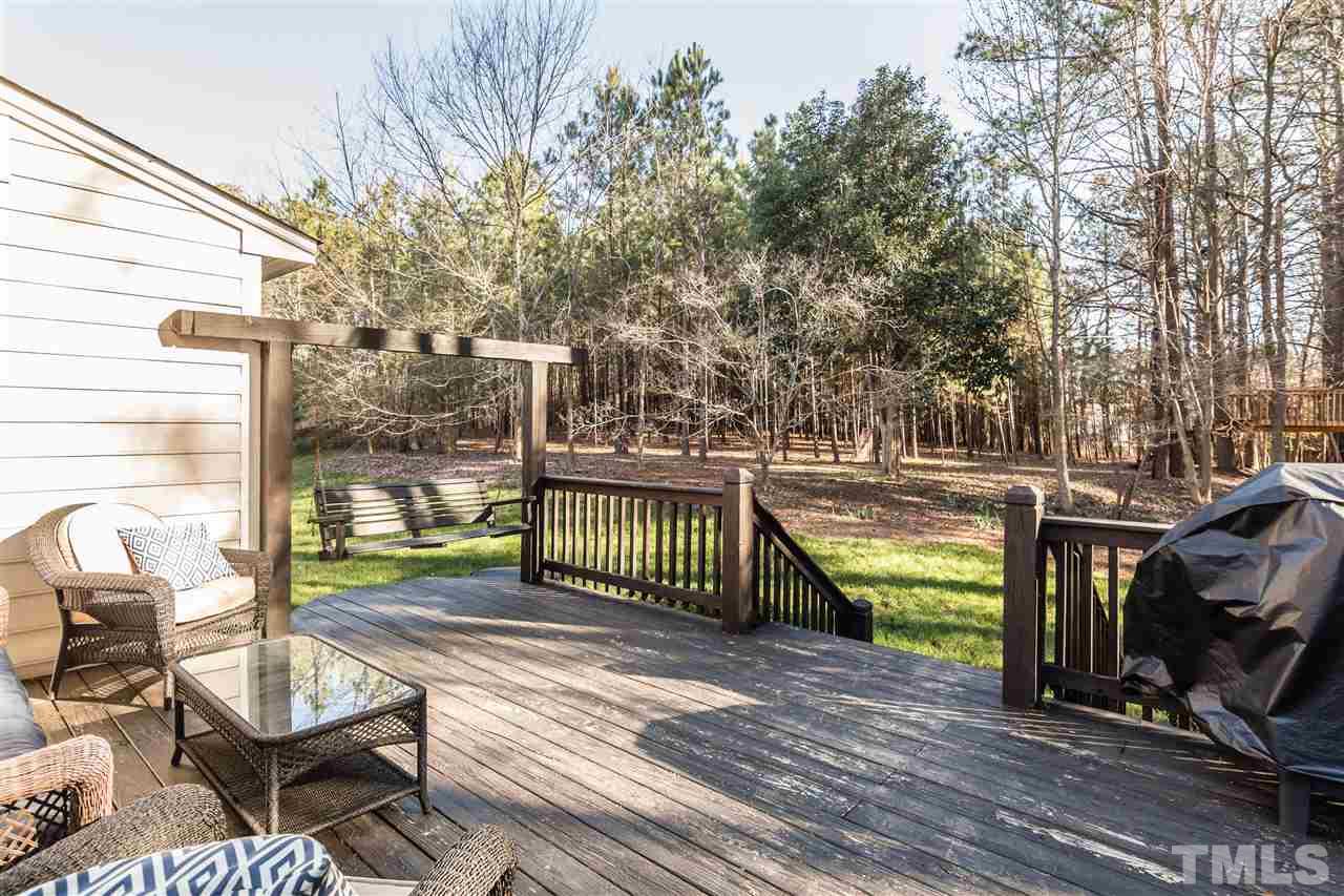 18 Striding Ridge Court Durham, NC 27713 - Photo 19 of 22 a view of a balcony with chairs