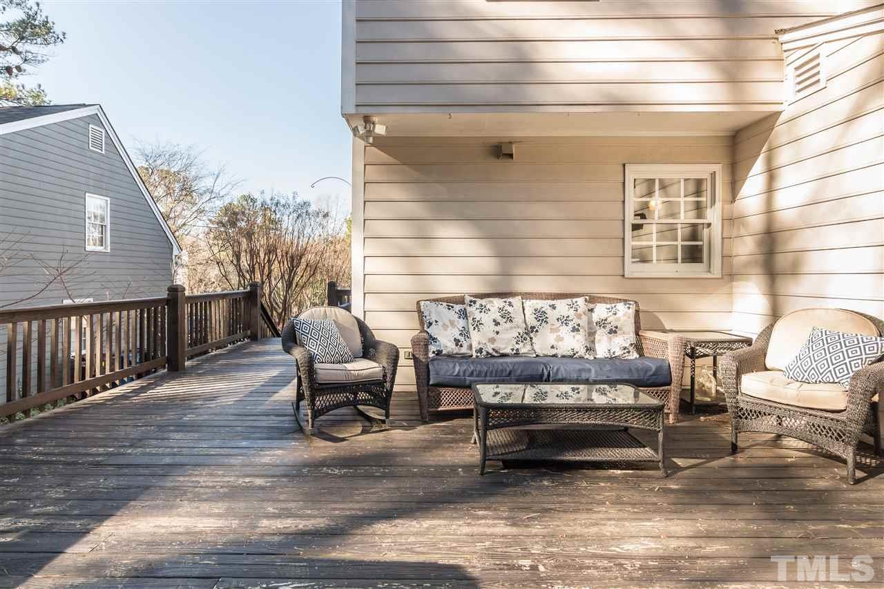 18 Striding Ridge Court Durham, NC 27713 - Photo 20 of 22 a view of a chair and table in the balcony