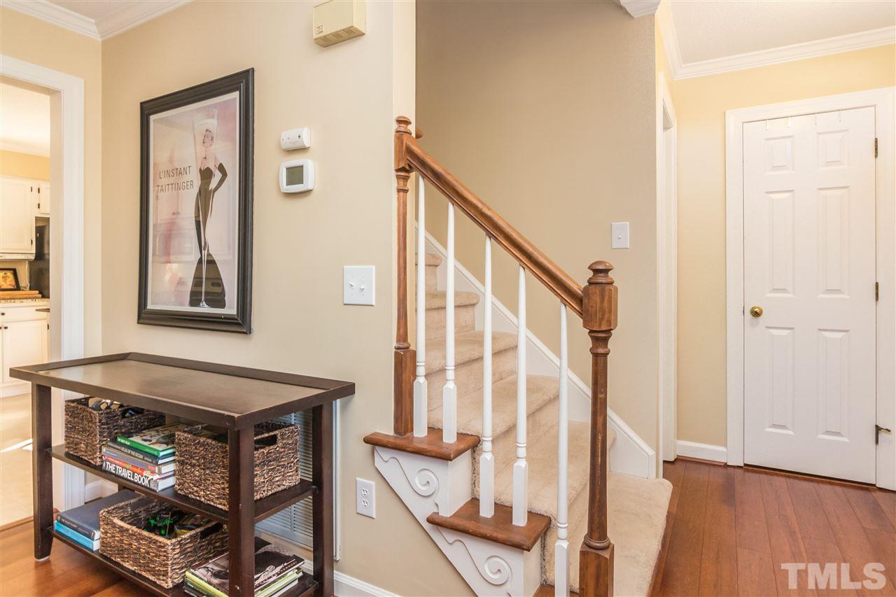 18 Striding Ridge Court Durham, NC 27713 - Photo 2 of 22 a view of front door with furniture