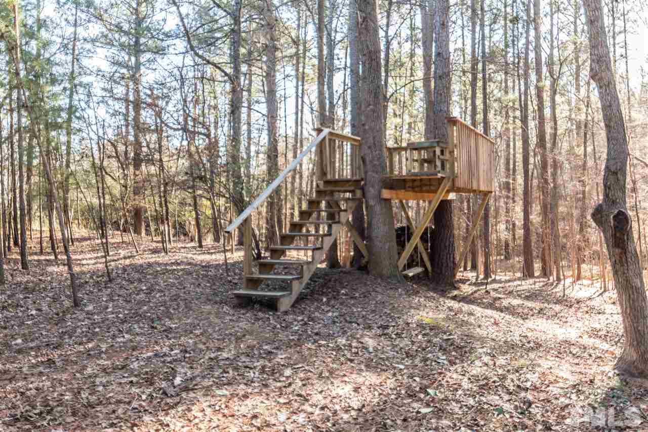 18 Striding Ridge Court Durham, NC 27713 - Photo 22 of 22 a view of outdoor space with seating area