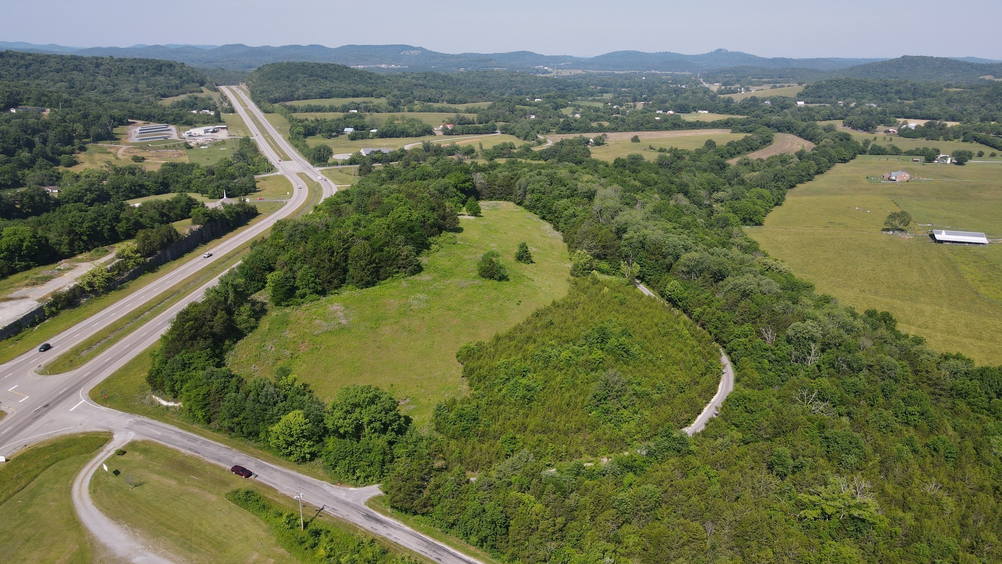 a view of a garden with a lake view