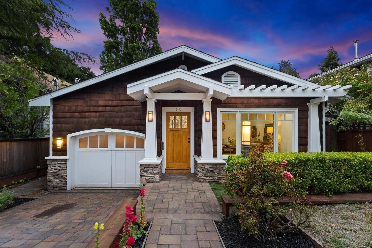 a front view of a house with a porch