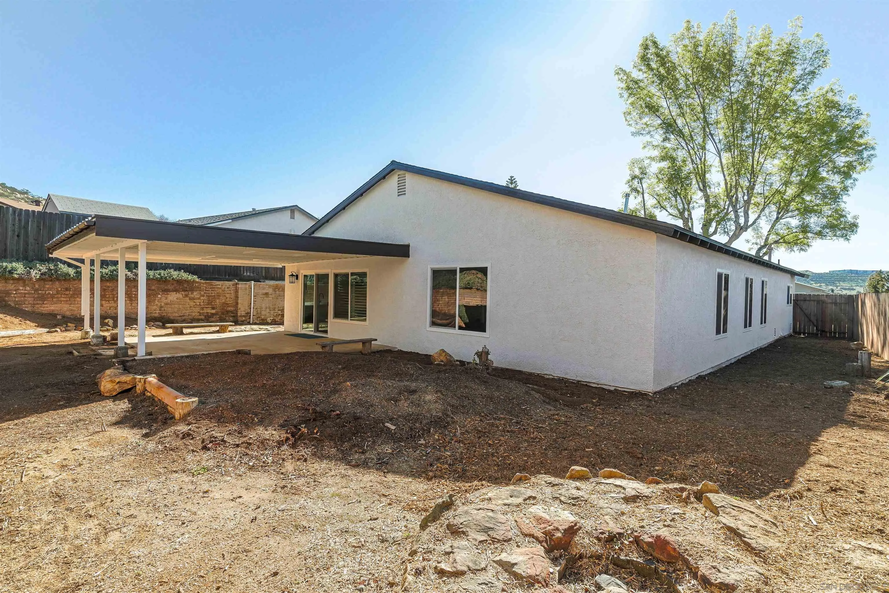 14558 Silla Street Poway, CA 92064 - Photo 19 of 20 a front view of a house with a yard
