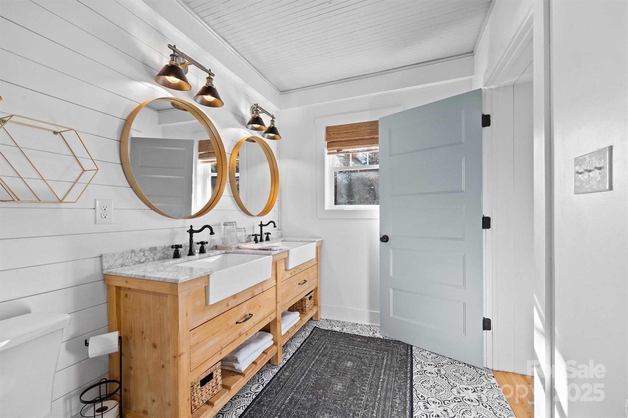 408 Morgan Street Fort Mill, SC 29715 - Photo 15 of 29 a bathroom with a sink and a mirror