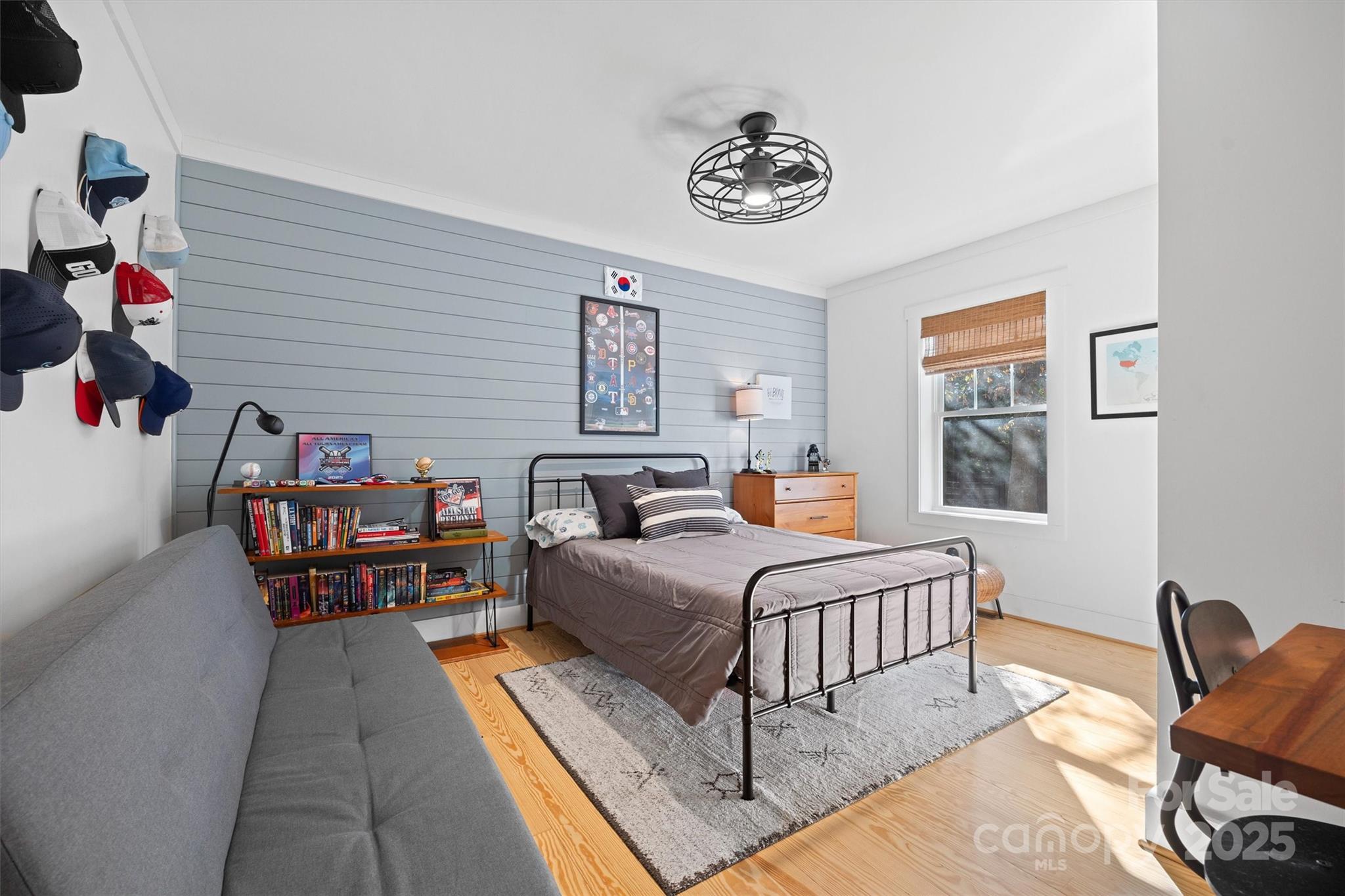 408 Morgan Street Fort Mill, SC 29715 - Photo 16 of 29 a bedroom with furniture and a book shelf