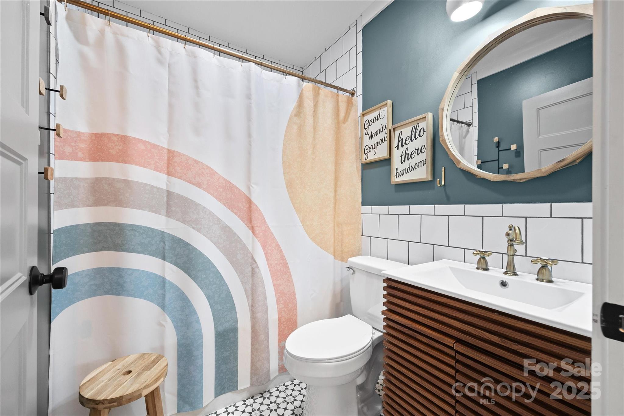 408 Morgan Street Fort Mill, SC 29715 - Photo 17 of 29 a bathroom with a sink a toilet and a mirror