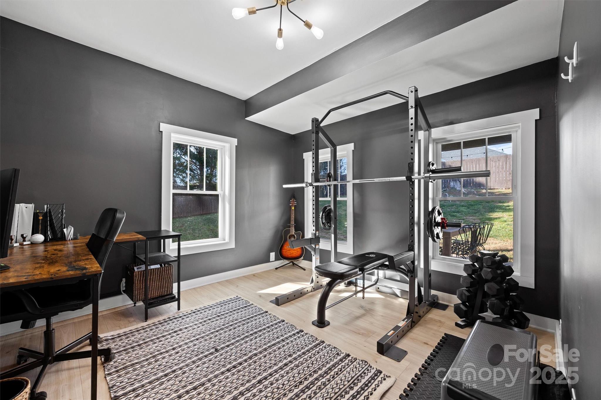 408 Morgan Street Fort Mill, SC 29715 - Photo 22 of 29 a living room with furniture a window and a chandelier