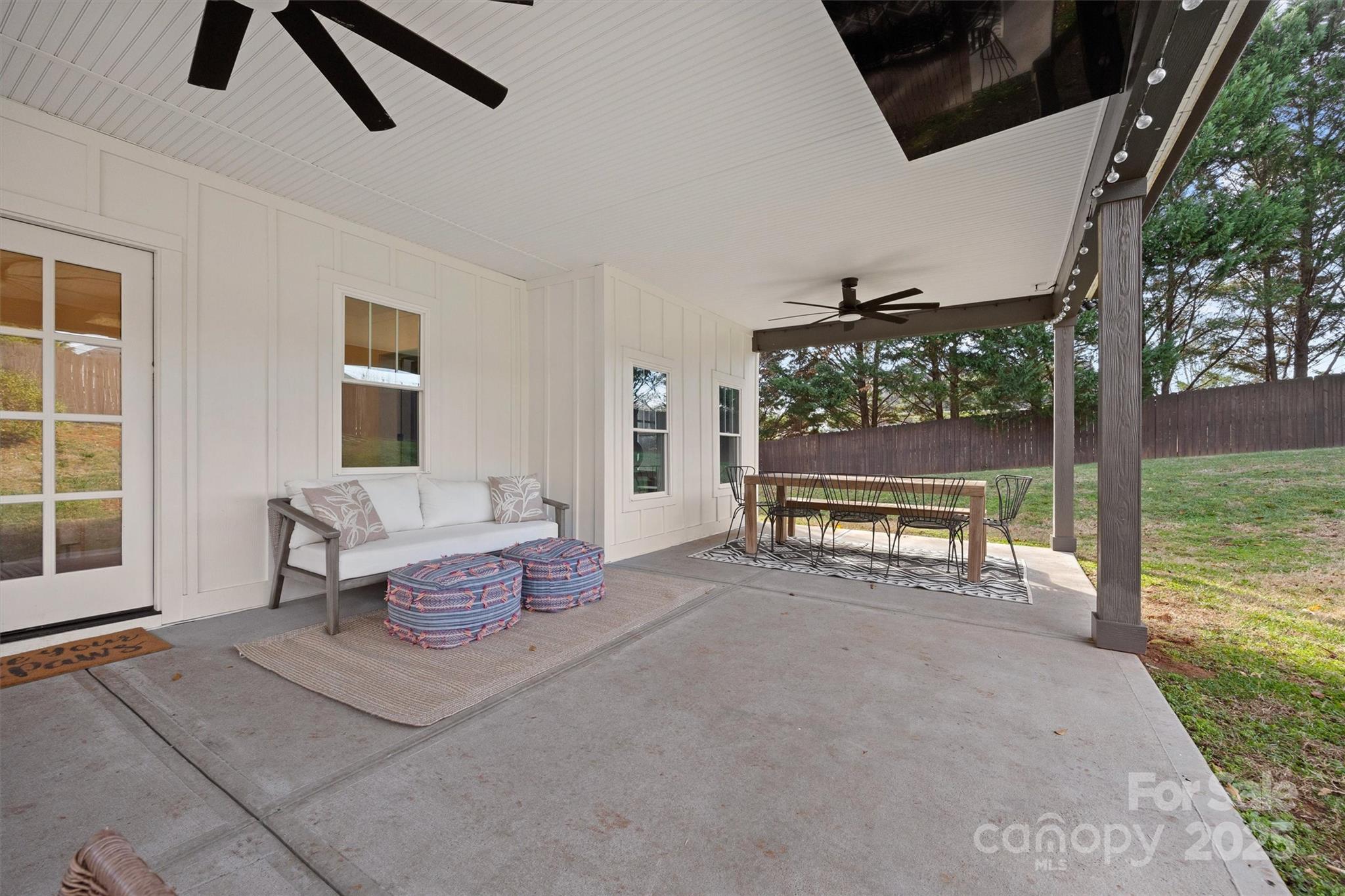 408 Morgan Street Fort Mill, SC 29715 - Photo 25 of 29 a living room with furniture and a floor to ceiling window
