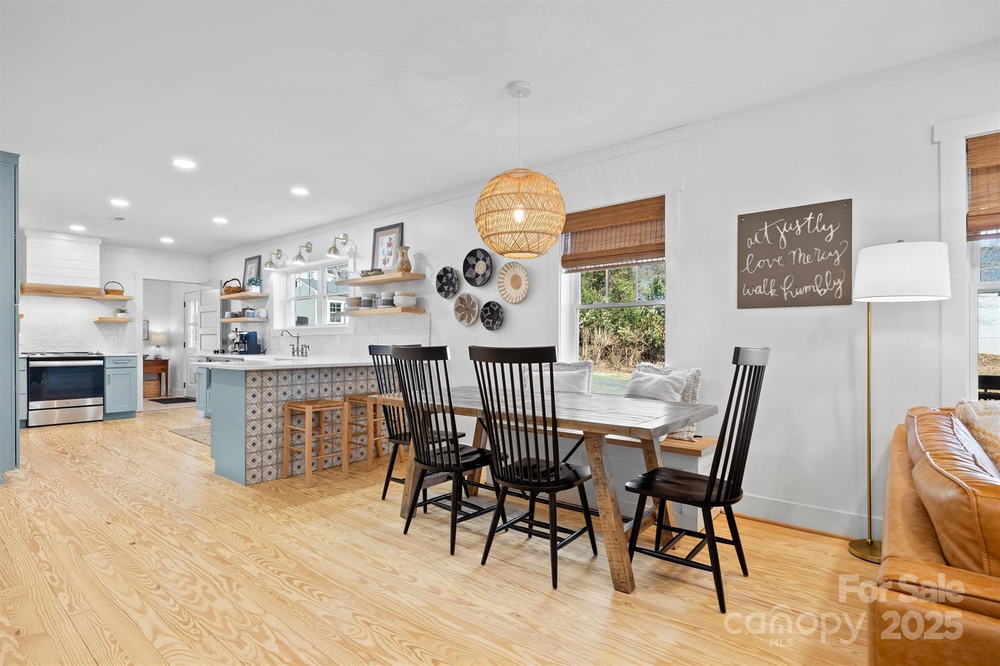408 Morgan Street Fort Mill, SC 29715 - Photo 6 of 29 a view of a dining room with furniture window and wooden floor