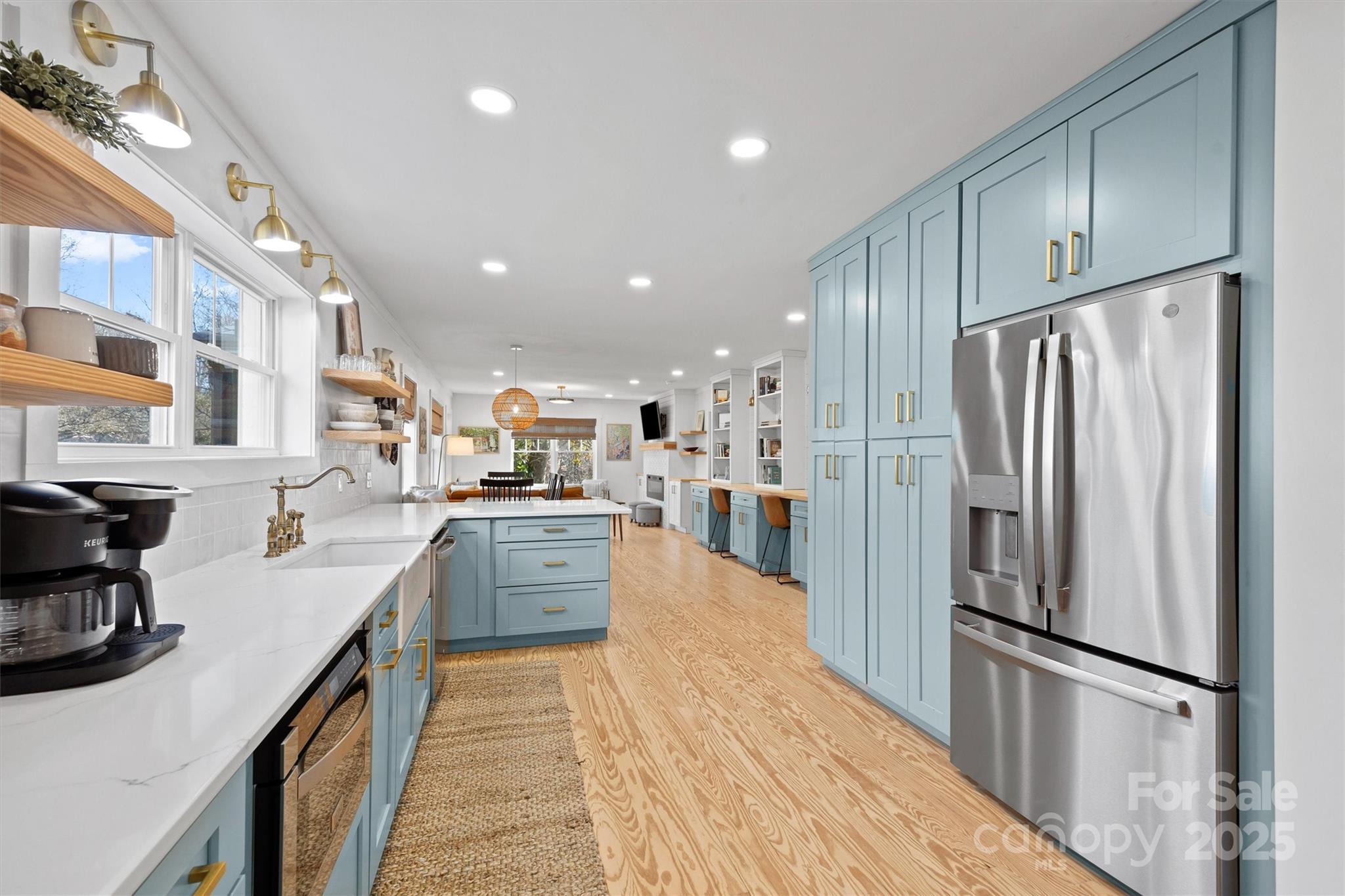 408 Morgan Street Fort Mill, SC 29715 - Photo 10 of 29 a kitchen with stainless steel appliances granite countertop a refrigerator a stove and a sink
