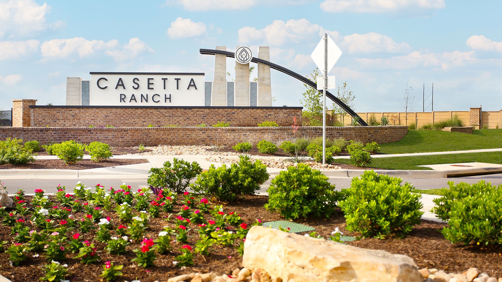 3073 Winding Creek Road Kyle, TX 78640 - Photo 12 of 24 a view of a street with a flower garden