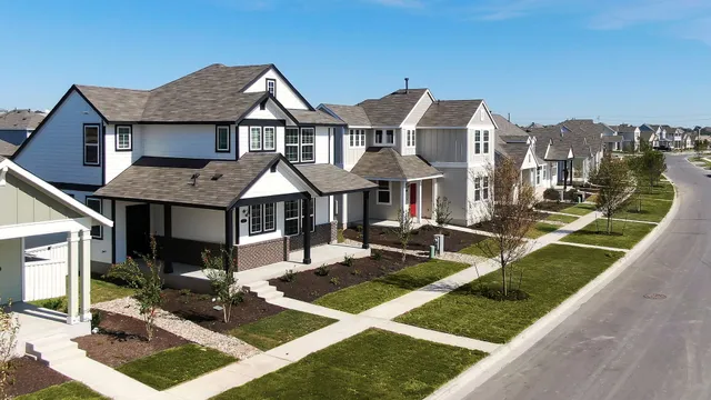 a front view of a house with yard porch and seating space