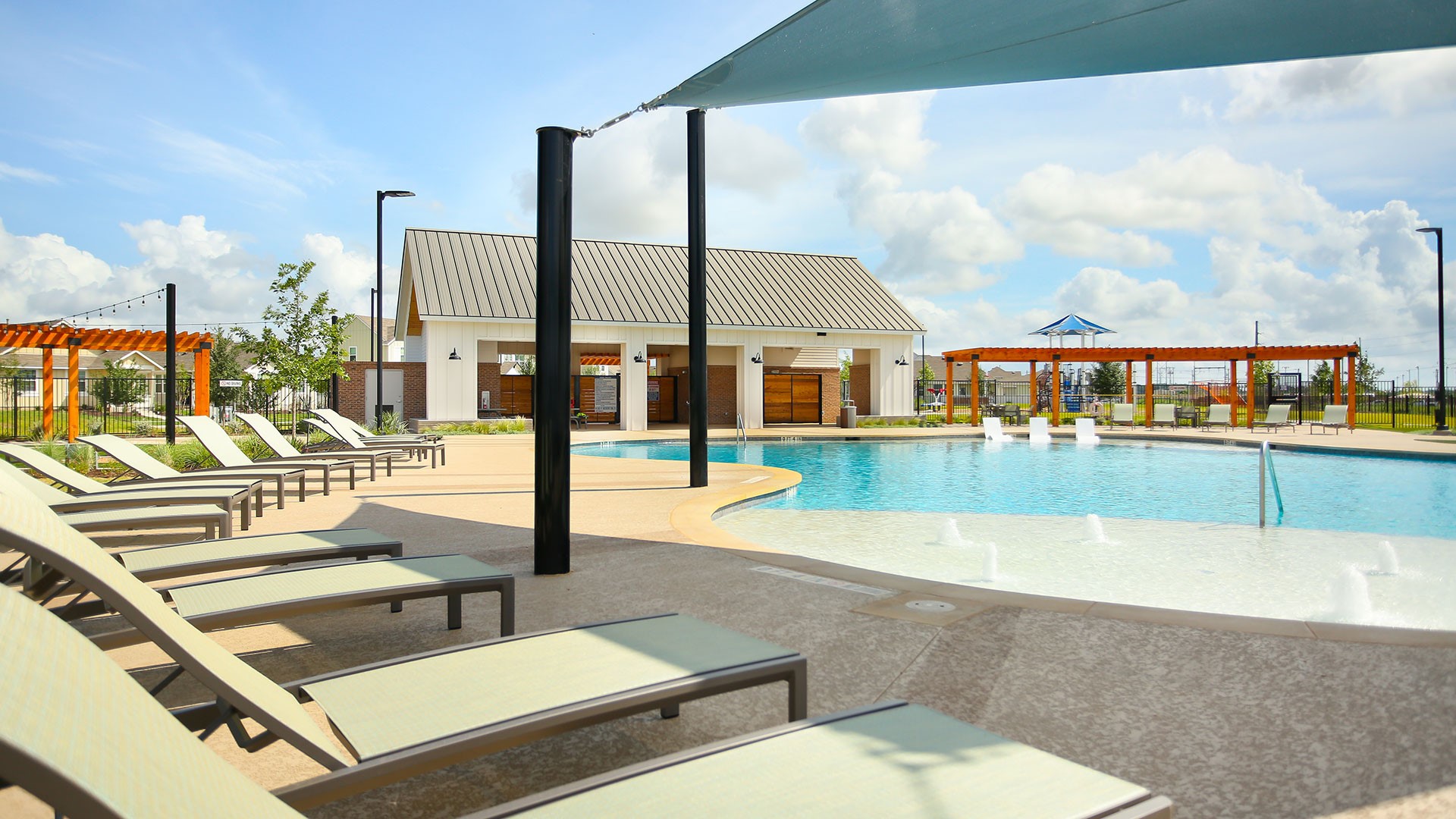 3073 Winding Creek Road Kyle, TX 78640 - Photo 18 of 24 a view of a swimming pool with outdoor seating