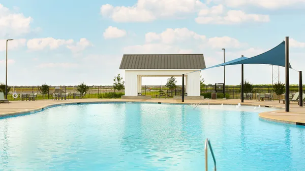 a view of an ocean with a swimming pool