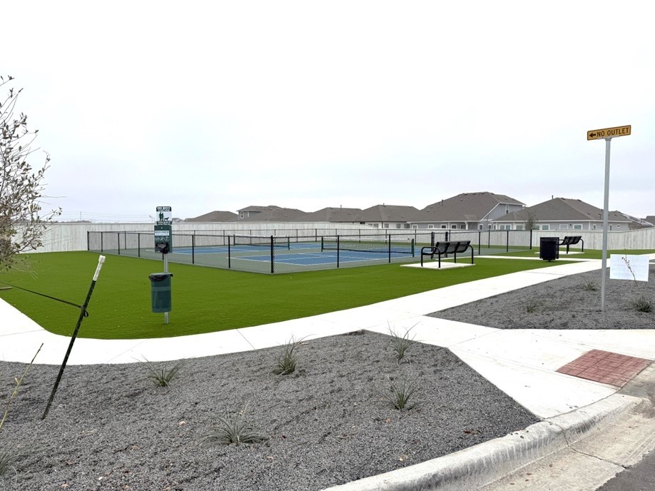 3073 Winding Creek Road Kyle, TX 78640 - Photo 24 of 24 a view of outdoor space with playground