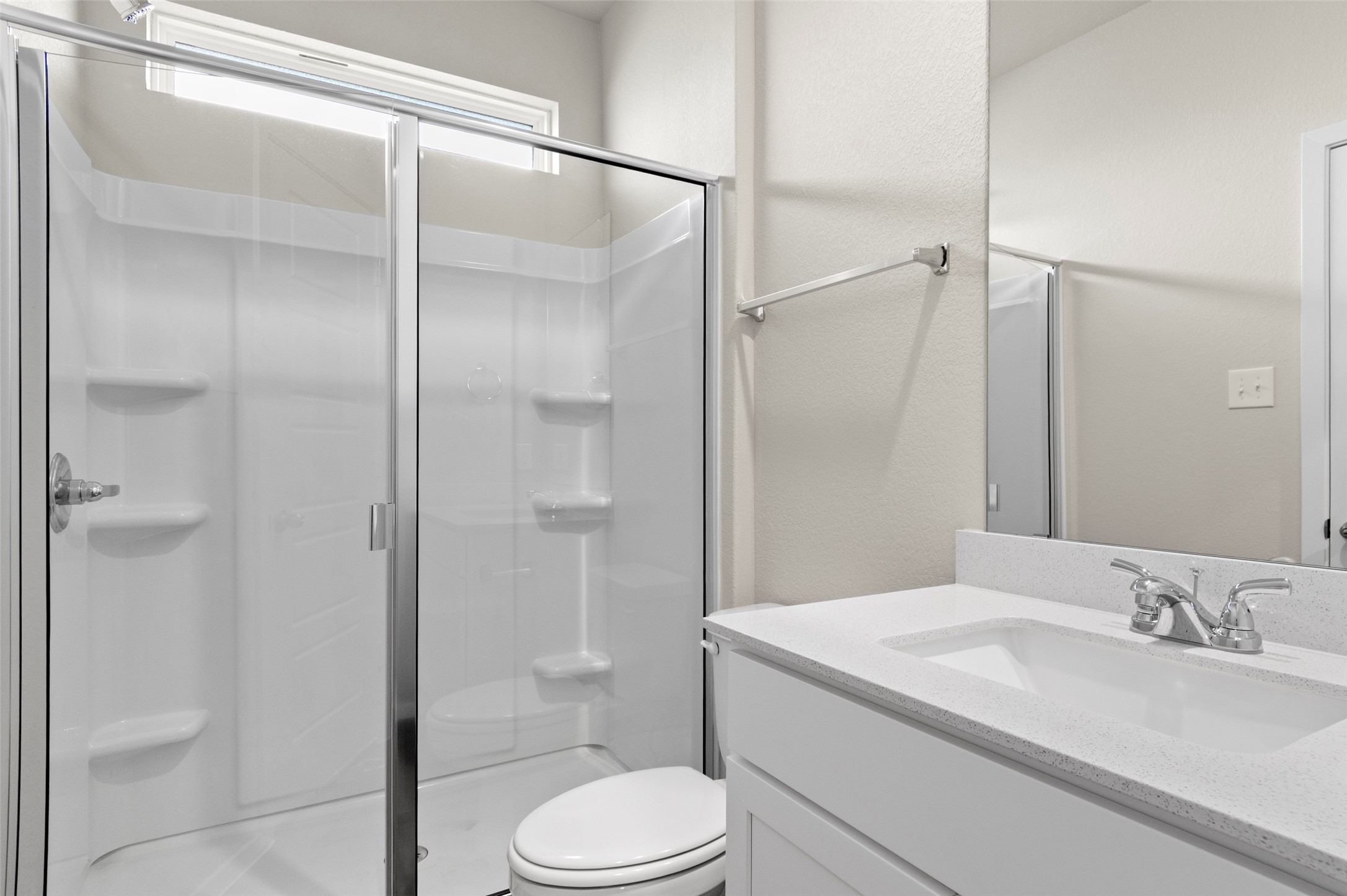 3073 Winding Creek Road Kyle, TX 78640 - Photo 7 of 24 a bathroom with a granite countertop sink toilet and shower