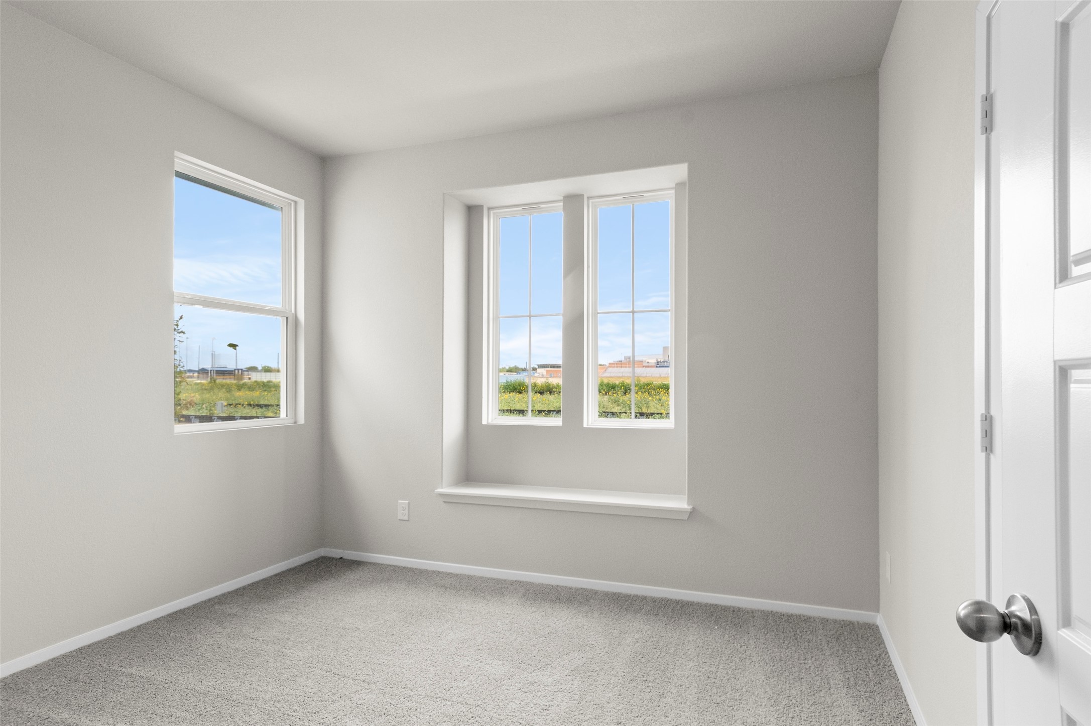 3073 Winding Creek Road Kyle, TX 78640 - Photo 9 of 24 an empty room with windows