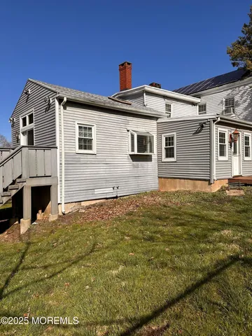 a view of a lake with houses in the back
