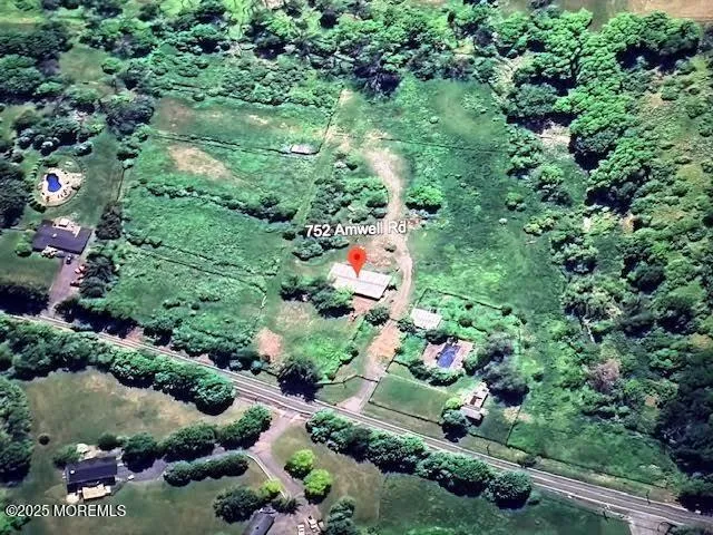 a view of a backyard with a garden
