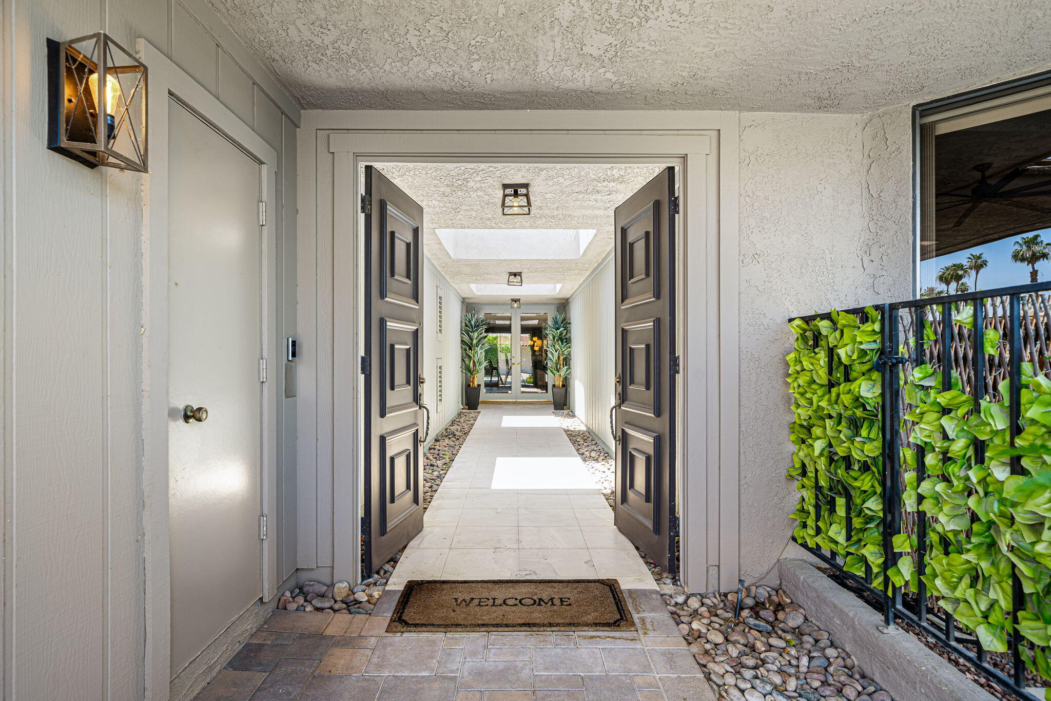 88 Princeton Drive Rancho Mirage, CA 92270 - Photo 30 of 37 a view of a entryway door of the house