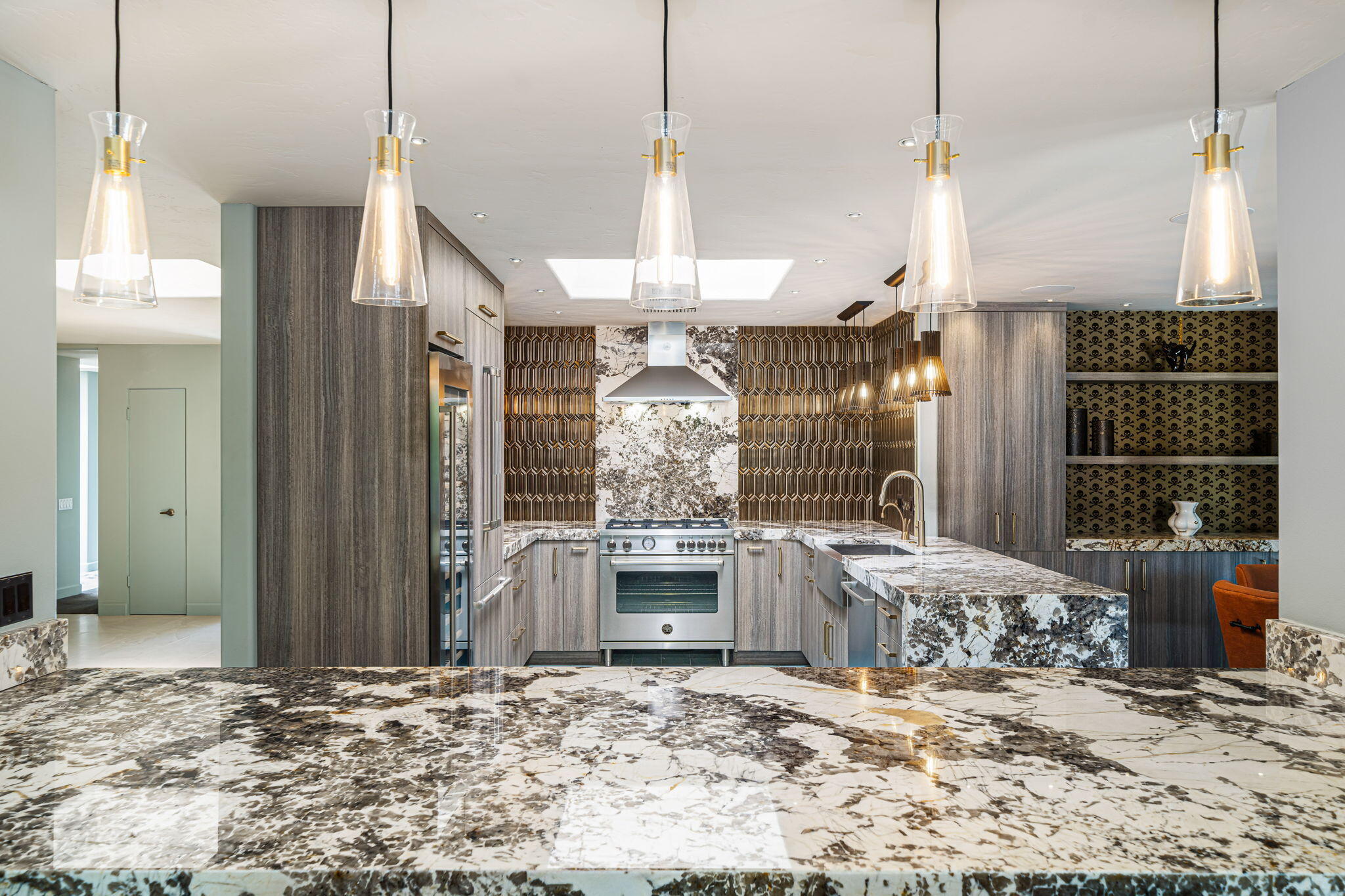 88 Princeton Drive Rancho Mirage, CA 92270 - Photo 8 of 37 a kitchen with a stove and a wooden floor