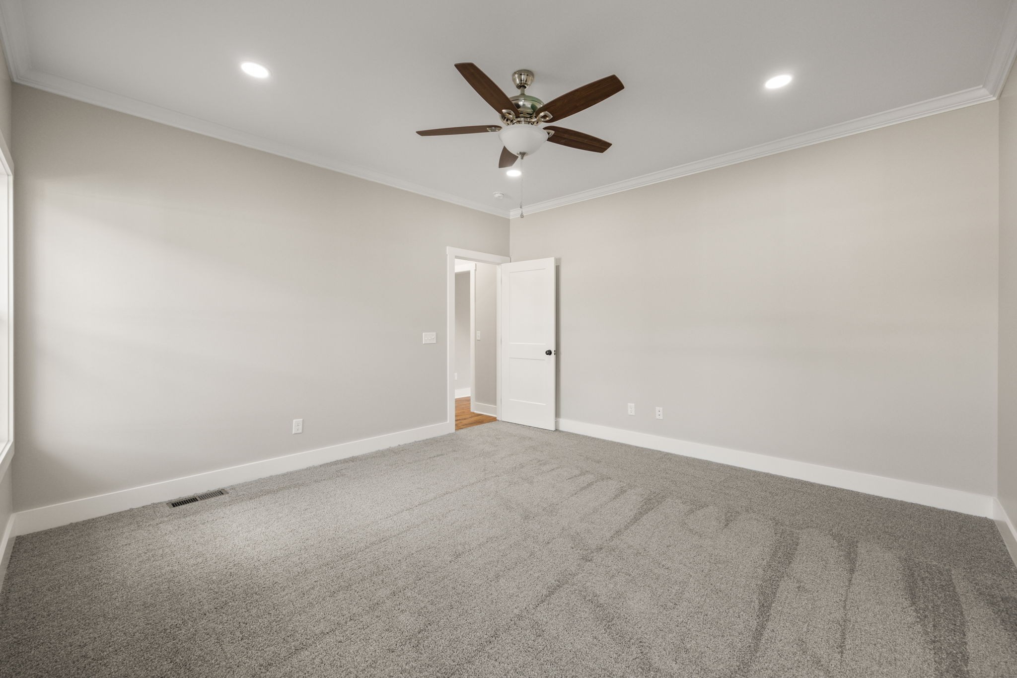 4675 Window Cliff Road Baxter, TN 38544 - Photo 12 of 24 an empty room with closet and ceiling fan