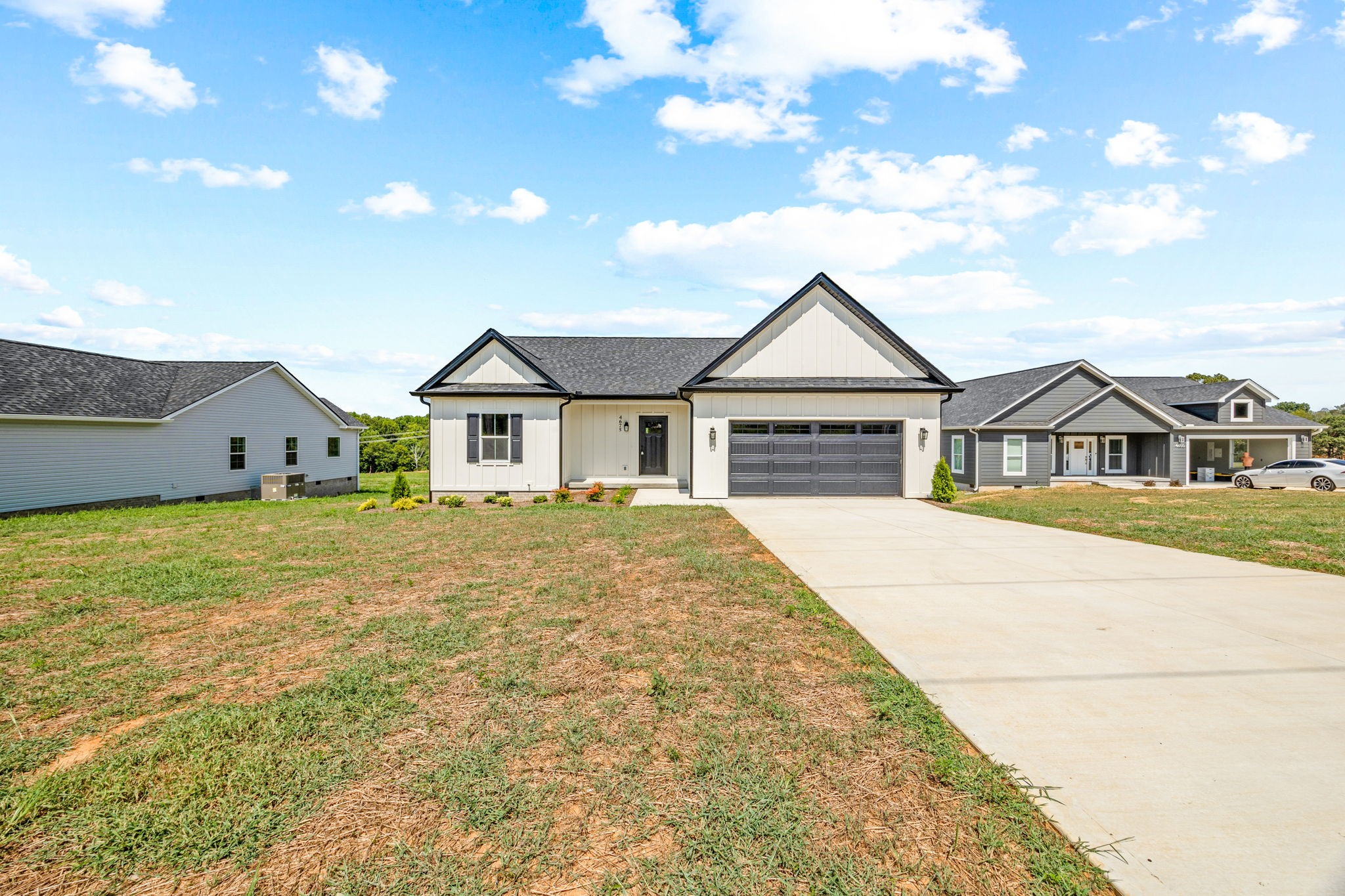 4675 Window Cliff Road Baxter, TN 38544 - Photo 2 of 24 a front view of a house with garden
