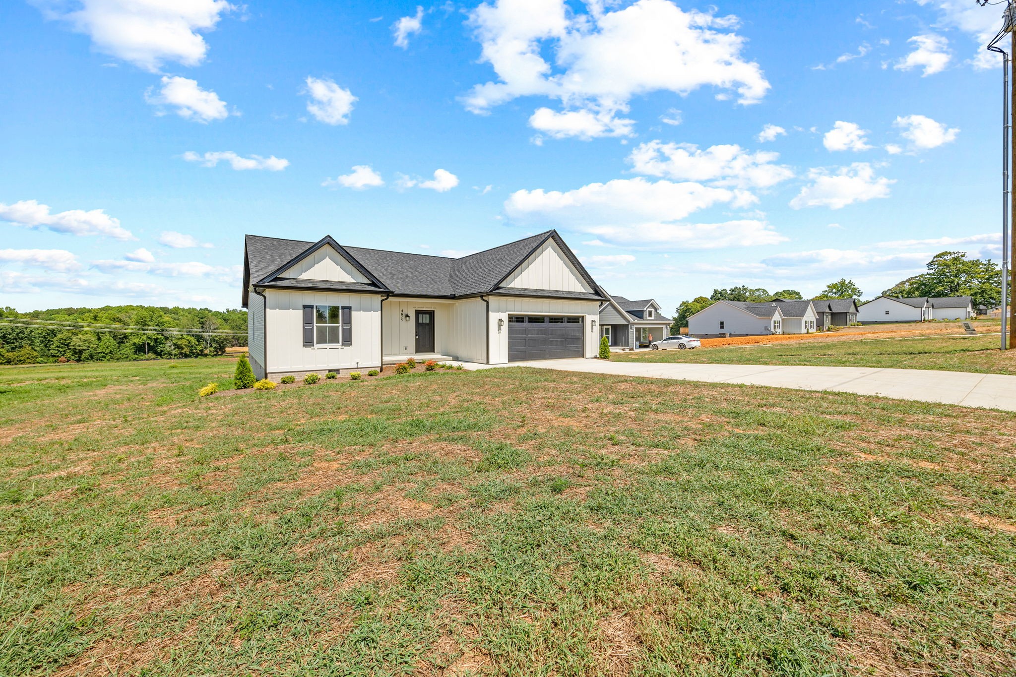 4675 Window Cliff Road Baxter, TN 38544 - Photo 4 of 24 a front view of a house with a garden