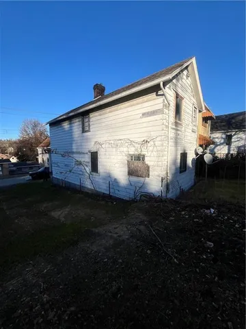 a front view of house with yard
