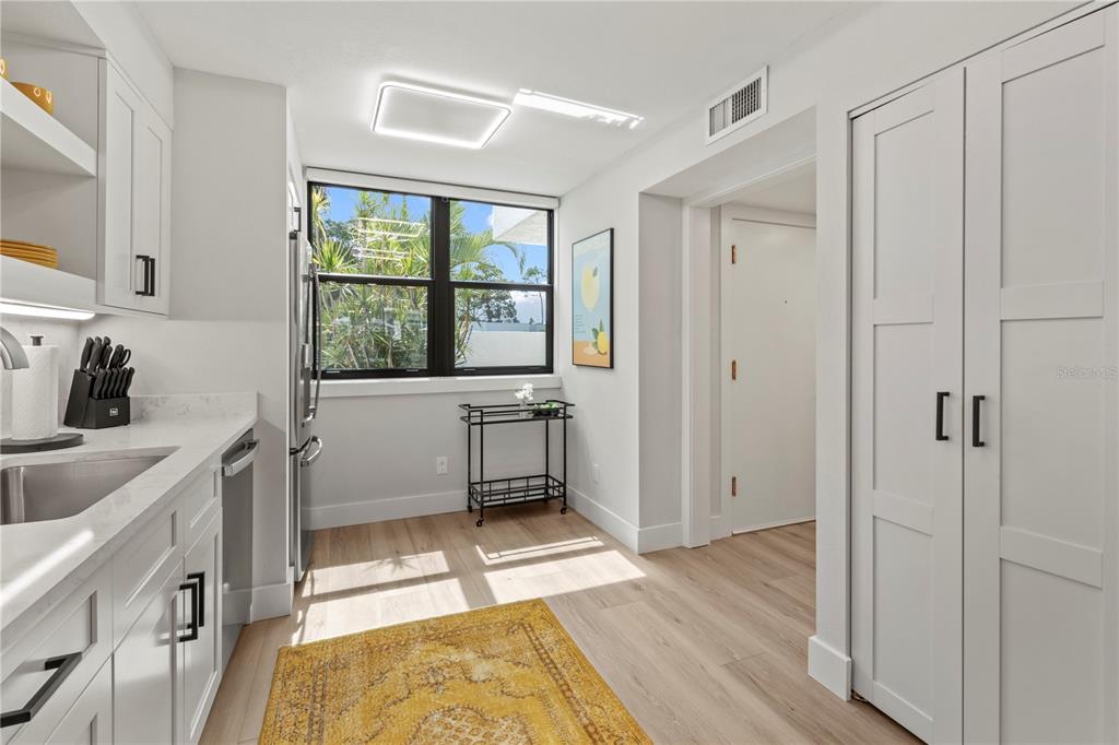 609 Bayport Way, Unit 609 Longboat Key, FL 34228 - Photo 12 of 77 a room with a bed and a window