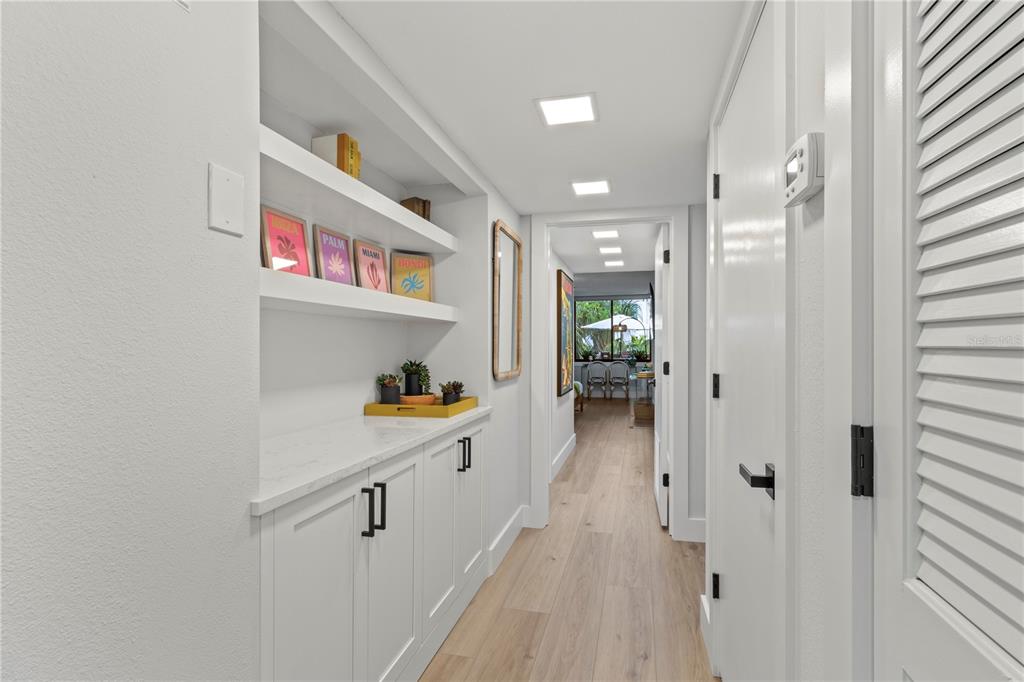 609 Bayport Way, Unit 609 Longboat Key, FL 34228 - Photo 6 of 77 a kitchen with stainless steel appliances a refrigerator and a cabinets