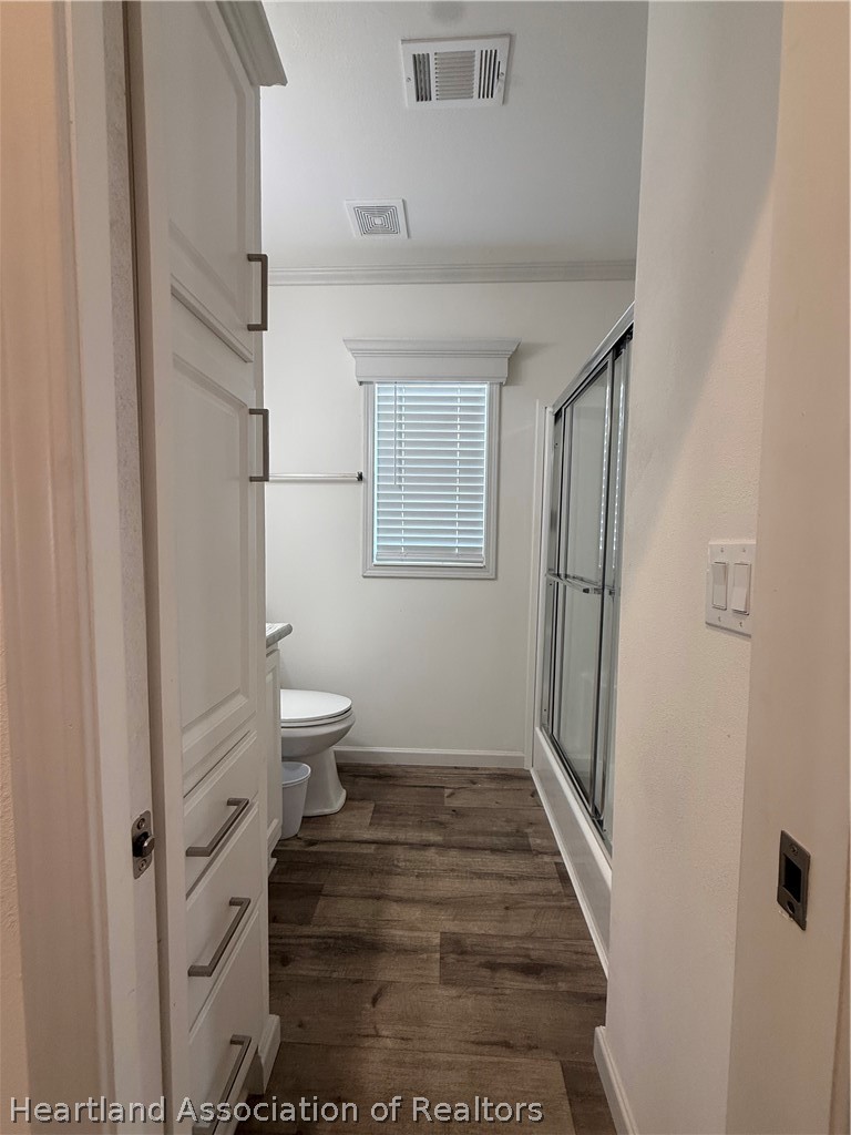 53 Freedom Way Lake Placid, FL 33852 - Photo 16 of 26 a bathroom with a sink and a toilet
